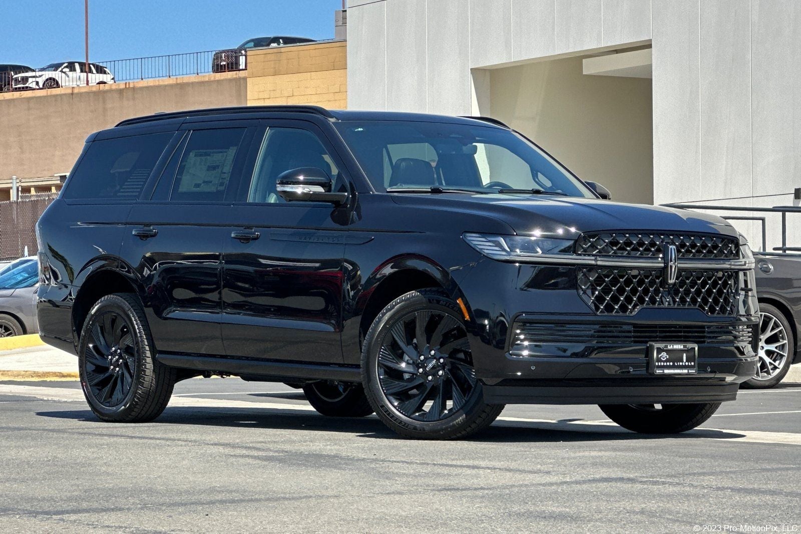 2026 Lincoln Navigator Reserve in Infinite Black Metallic Clearcoat — front three-quarter view