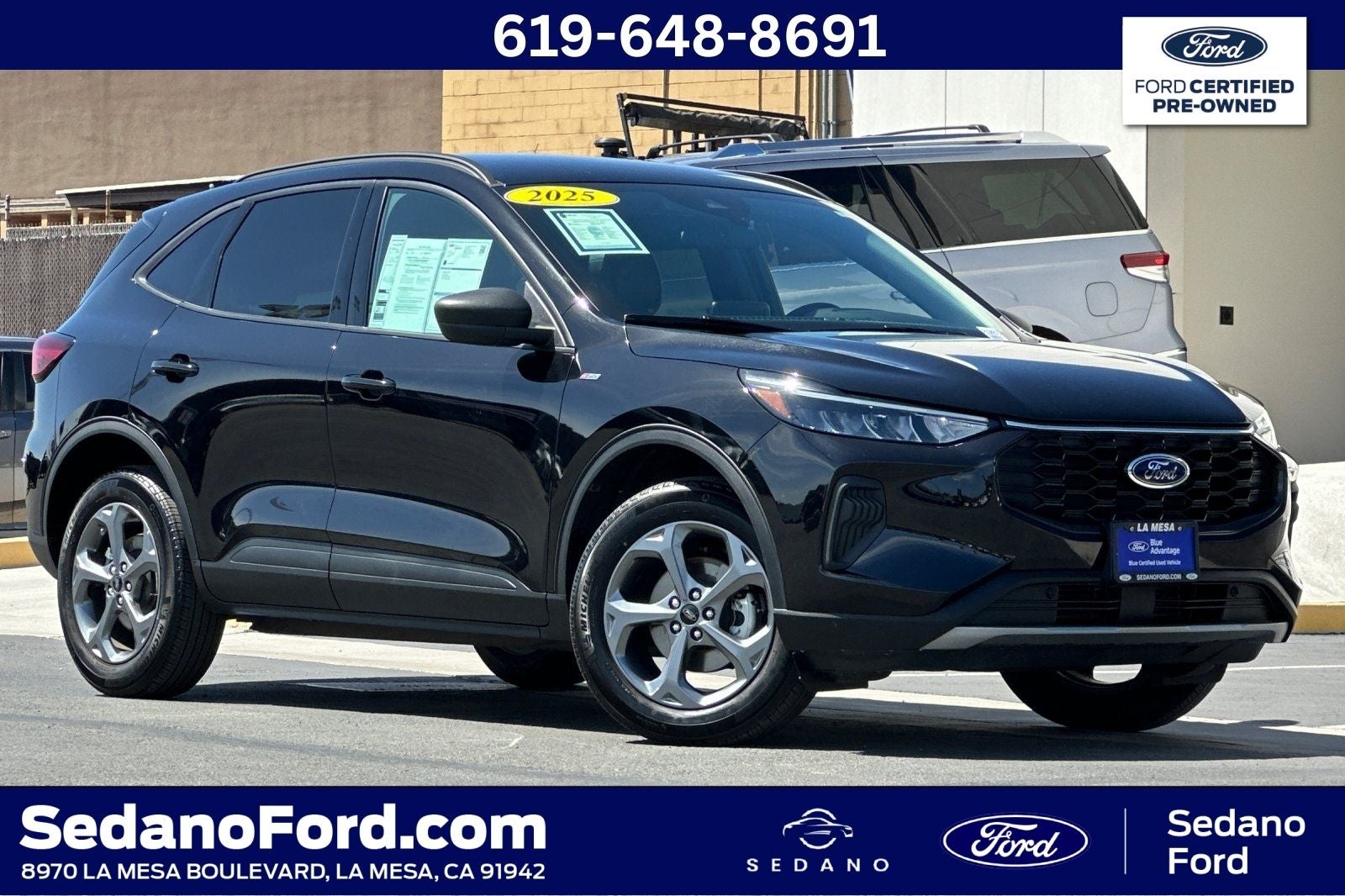 2025 Ford Escape ST-Line in Agate Black Metallic — front three-quarter view