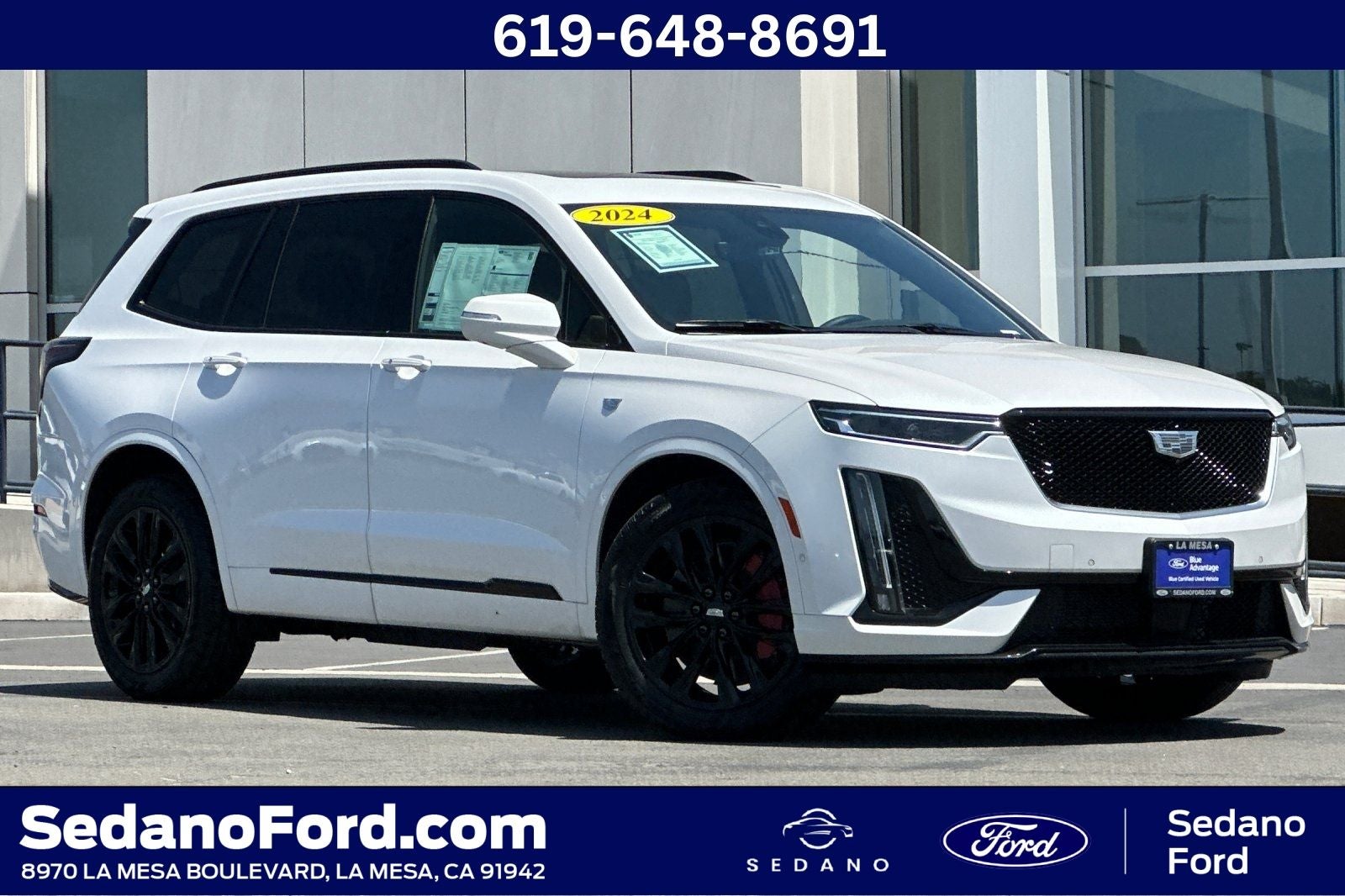 2024 Cadillac XT6 Sport in Crystal White Tricoat — front three-quarter view