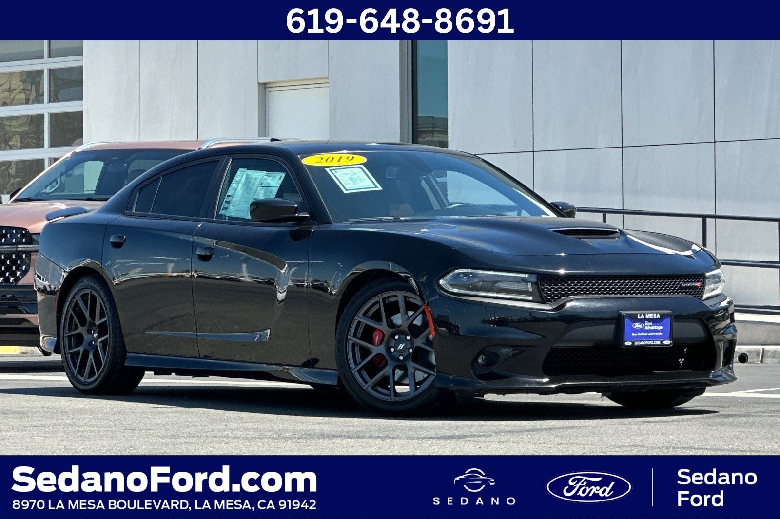 2019 Dodge Charger GT PLUS in Pitch Black Clearcoat — front three-quarter view