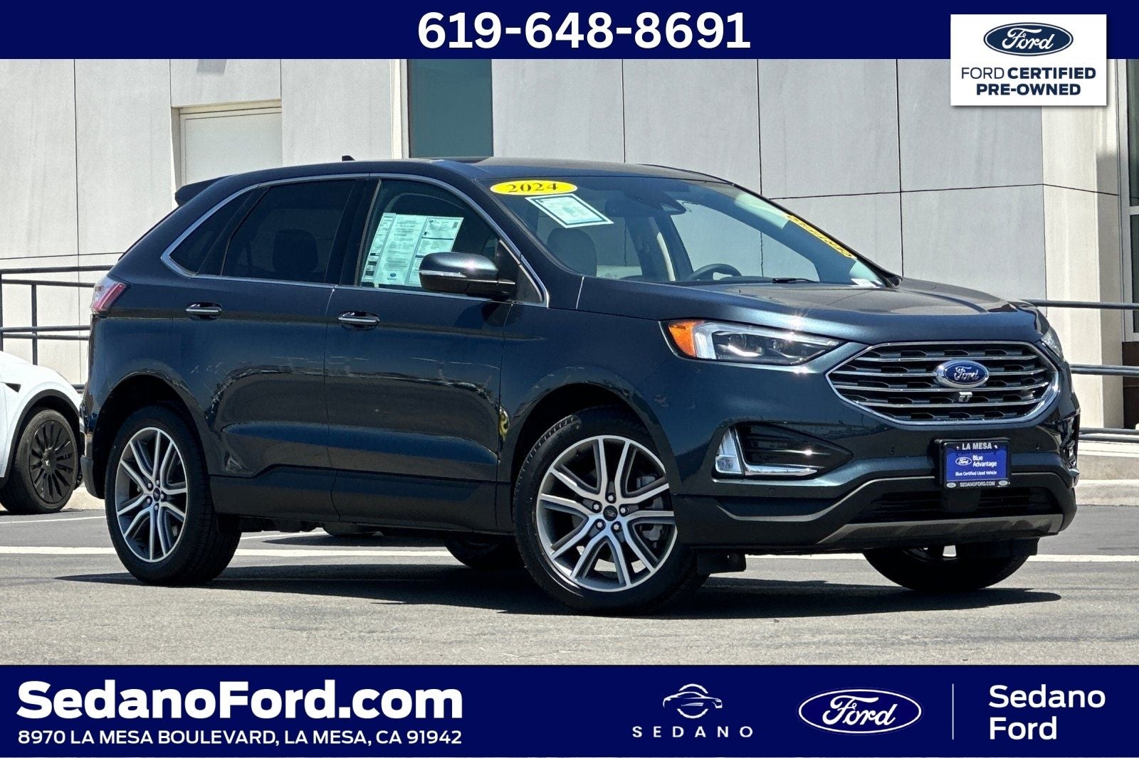 2024 Ford Edge Titanium in Stone Blue Metallic — front three-quarter view
