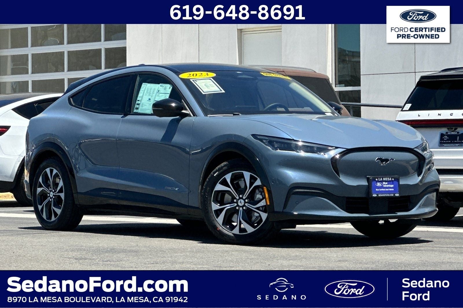 2023 Ford Mustang Mach-E Premium in Vapor Blue Metallic — front three-quarter view