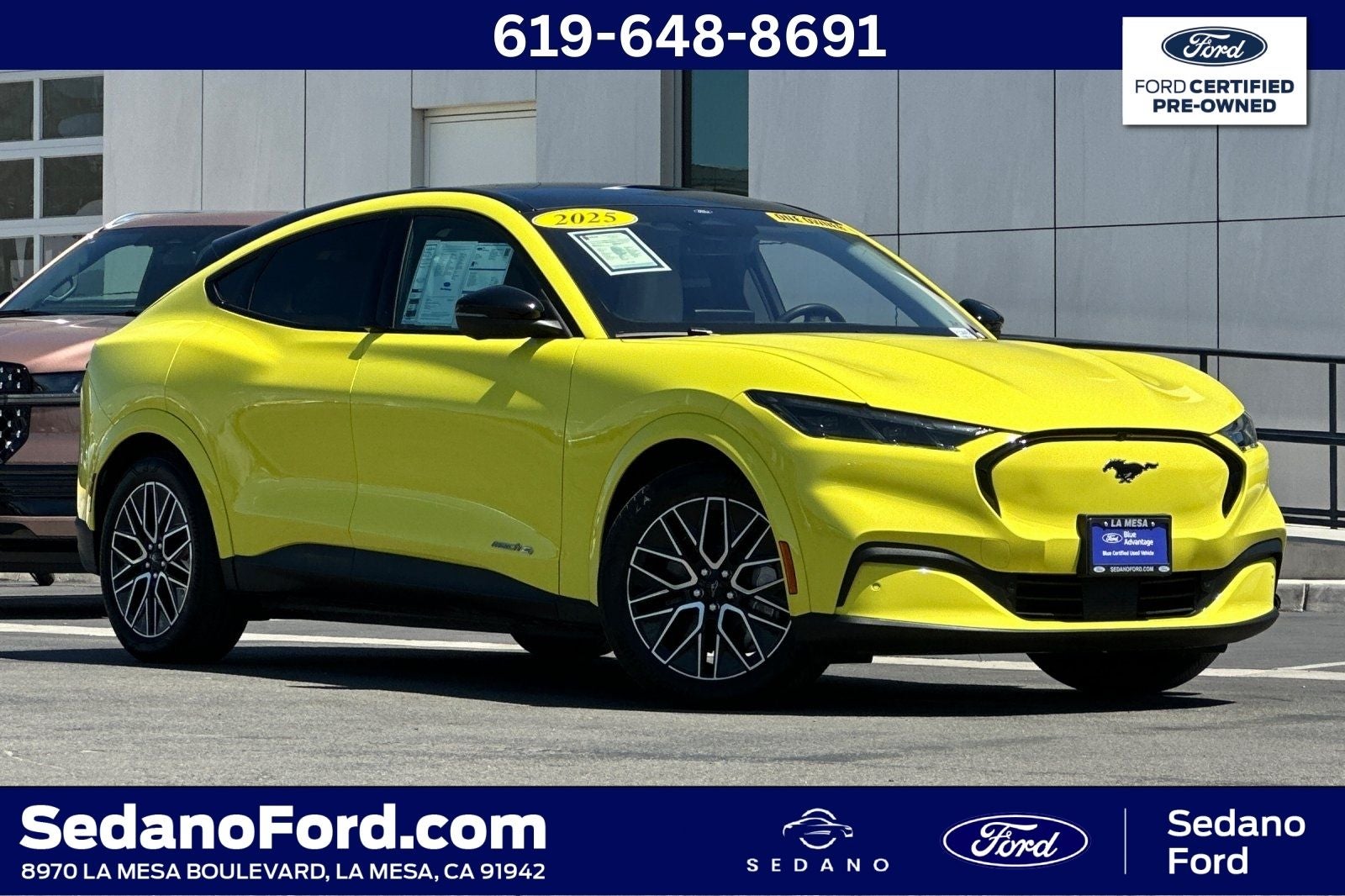 2025 Ford Mustang Mach-E Premium in Grabber Yellow — front three-quarter view