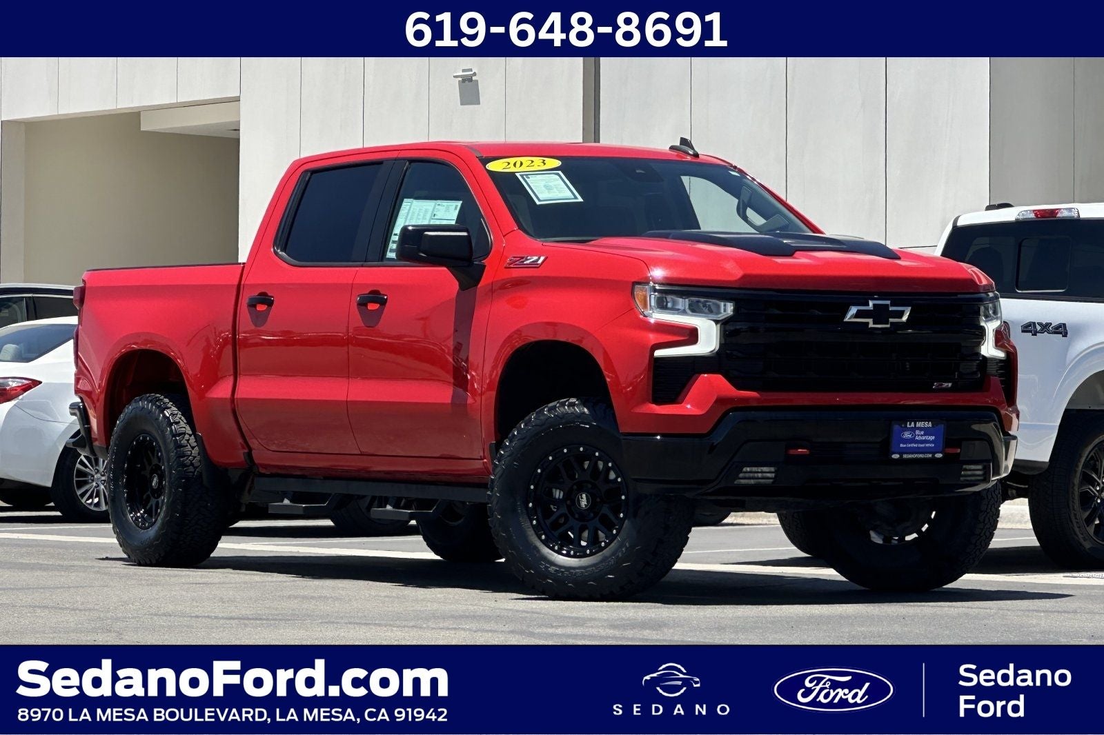 2023 Chevrolet Silverado 1500 LT Trail Boss in Radiant Red Tintcoat — front three-quarter view