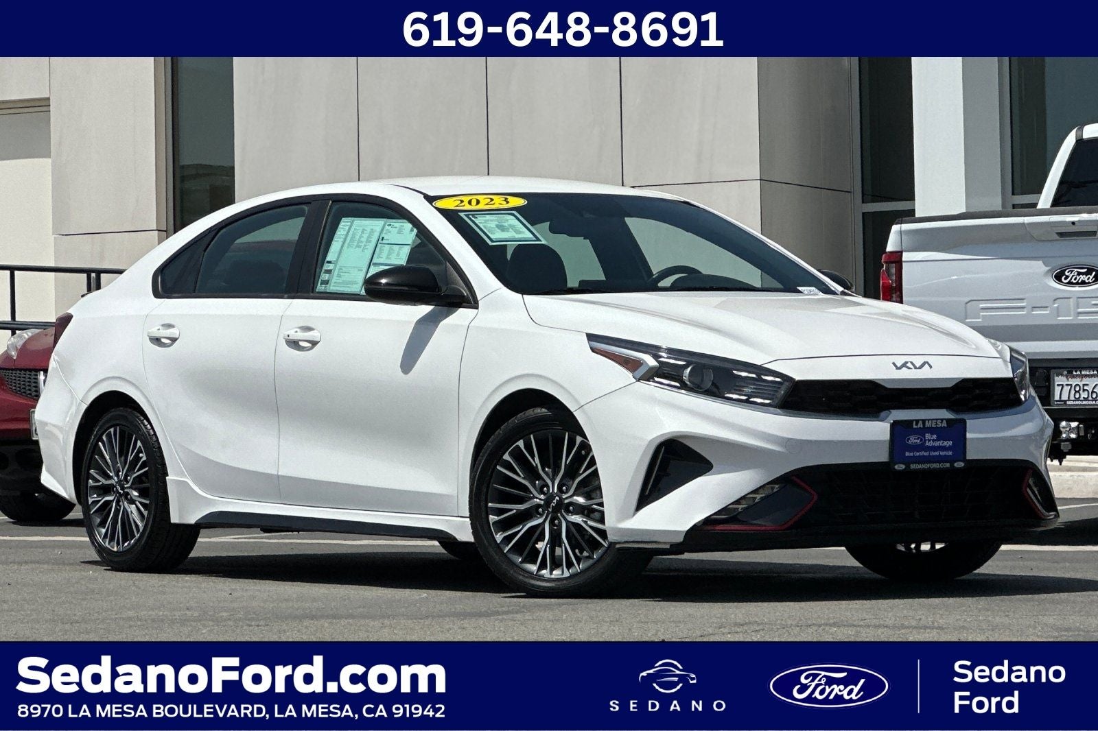 2023 Kia Forte GT-Line in Snow White Pearl — front three-quarter view